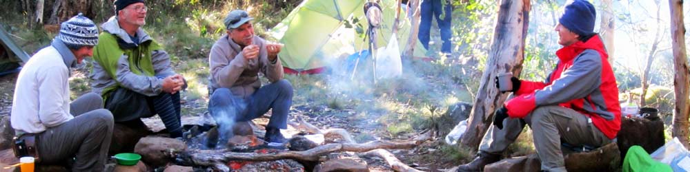 Bushwalkers around the camp fire enjoy a camping trip